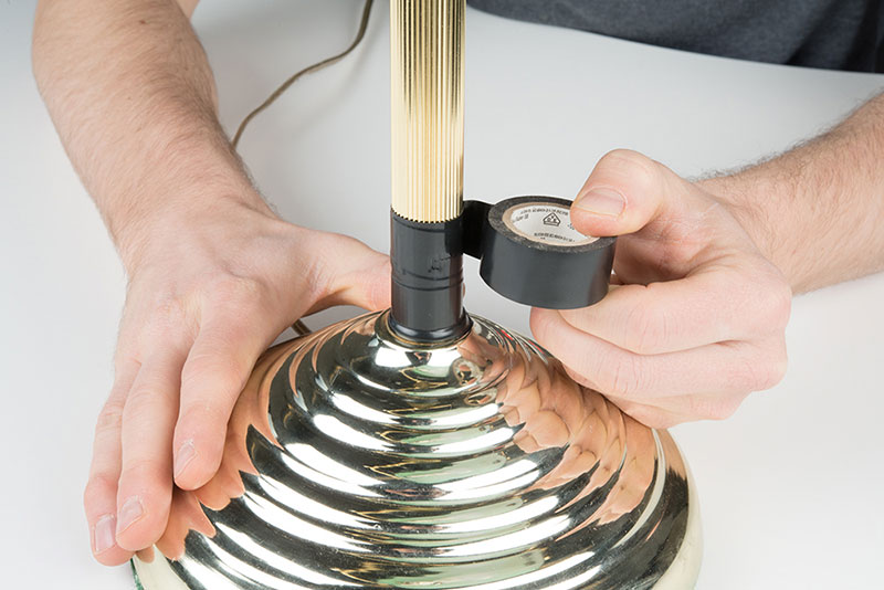 wrap some electrical tape around the post